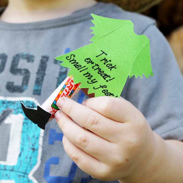 child holding halloween candy