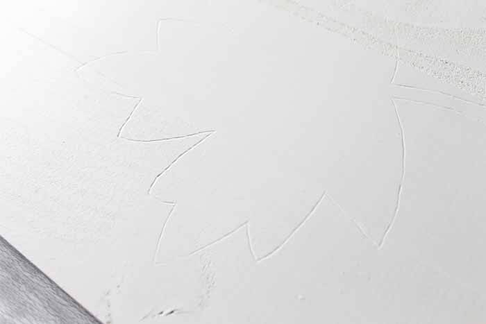 drawn leaf on white paper