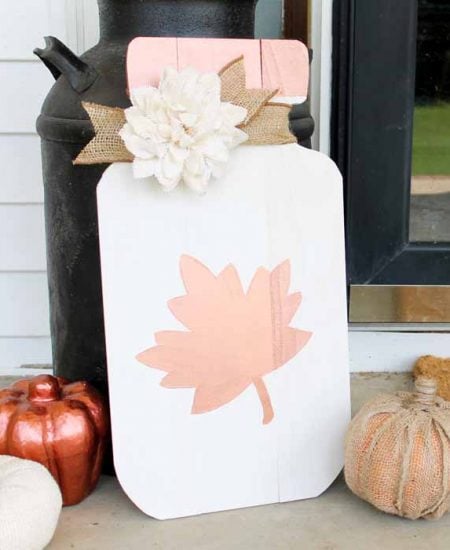 Fall Mason Jar Wood Cut out on front porch in front of black door