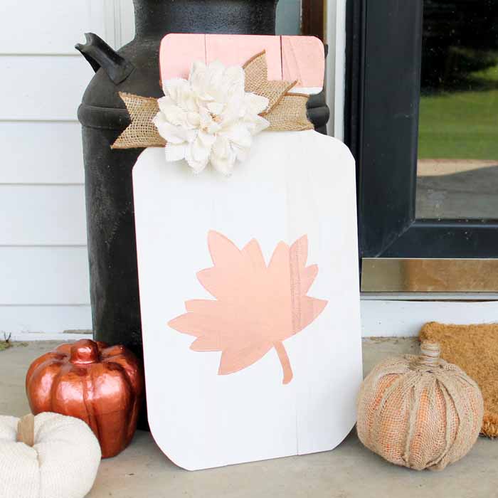 Fall Mason Jar Wood Cut out on front porch in front of black door