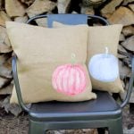 Make a pumpkin pillow with these easy to follow instructions! Includes download of watercolor pumpkin images!