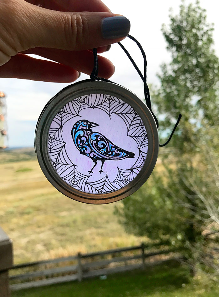 raven halloween Cricut suncatcher outside in daylight