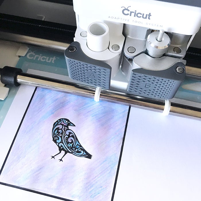 cricut cutting a picture of a raven