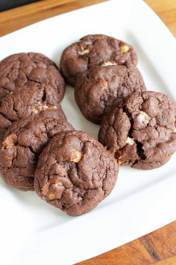 plate of snickers cookies on white background