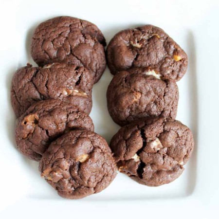 hot snickers cookies on a white plate