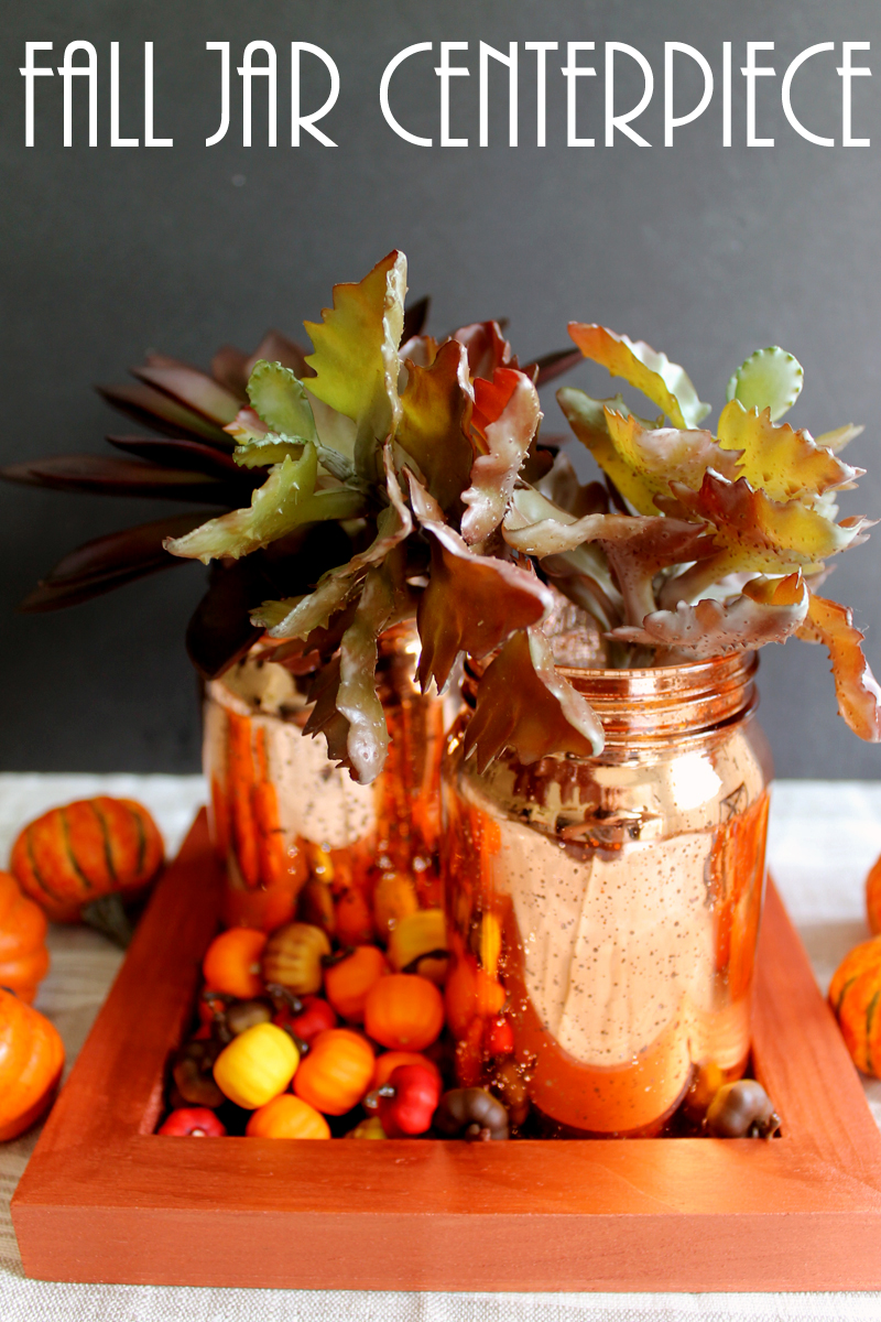 metallic mason jars filled with fall leaves