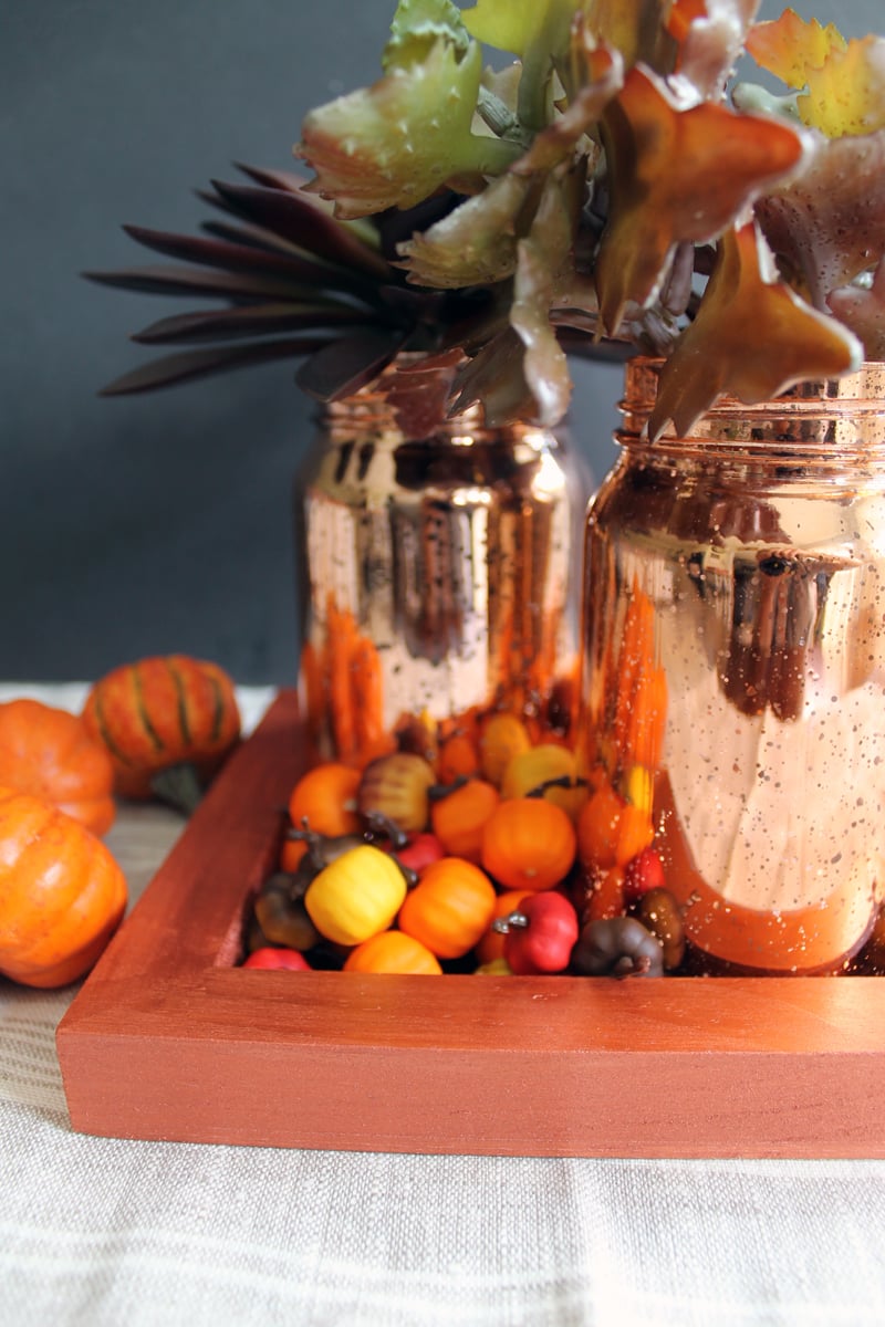 orange tray with metallic orange mason jars