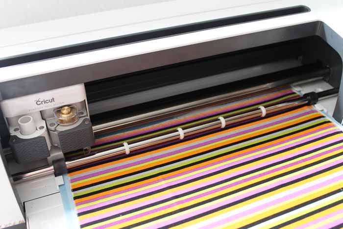 Cutting machine with striped fabric