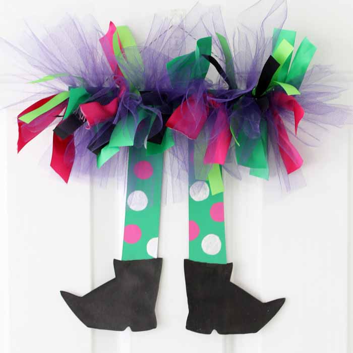 These colorful witch legs are fun and easy Halloween decor you can make in minutes