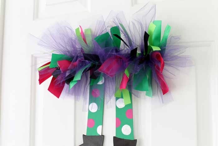 You can hang these colorful halloween witch legs anywhere in your home