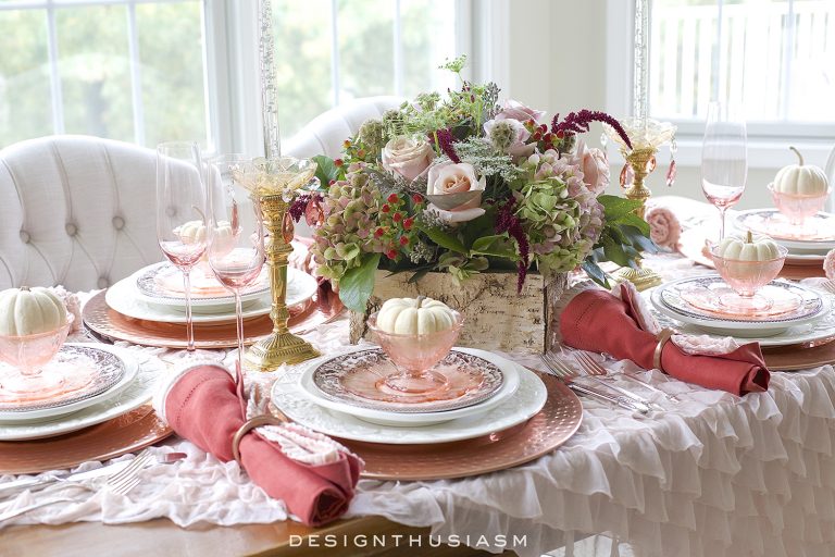 thanksgiving table with pink flowers and linens