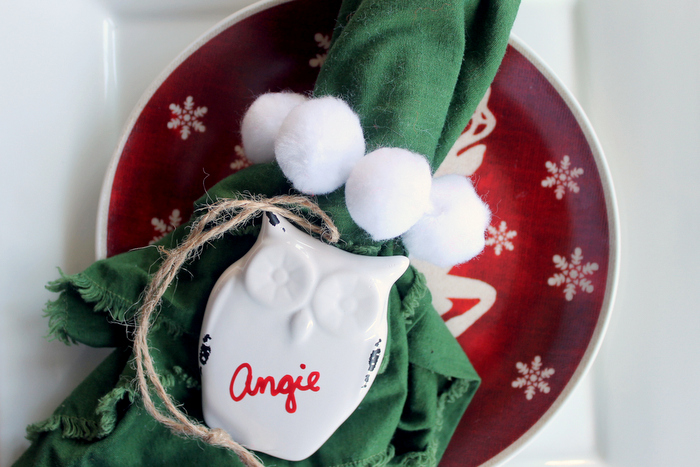 white pom pom garland napkin ring