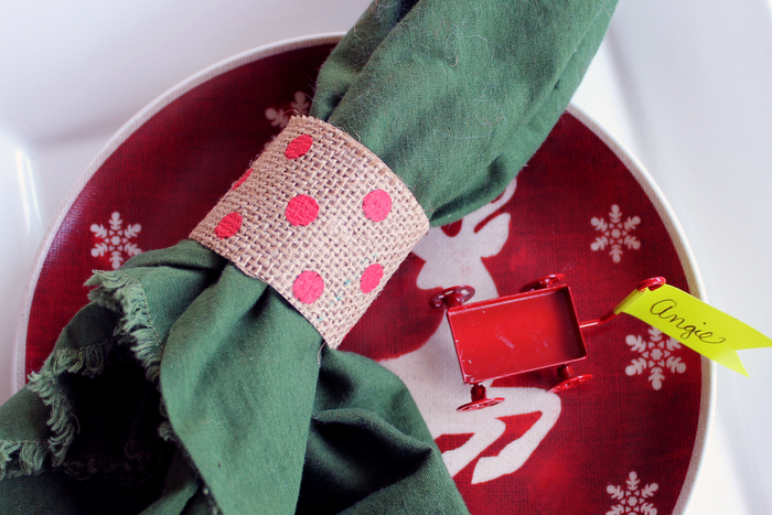 burlap napkin ring around green napkin