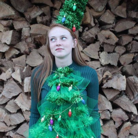 This Christmas sweater with lights is perfect to make and wear to an Ugly Christmas Sweater Party!