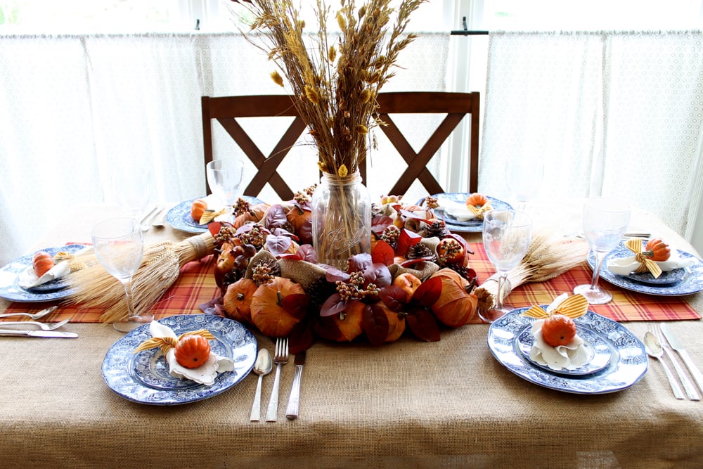 This Thanksgiving tablescape is created with fun DIY Thanksgiving decorations you can make on your own