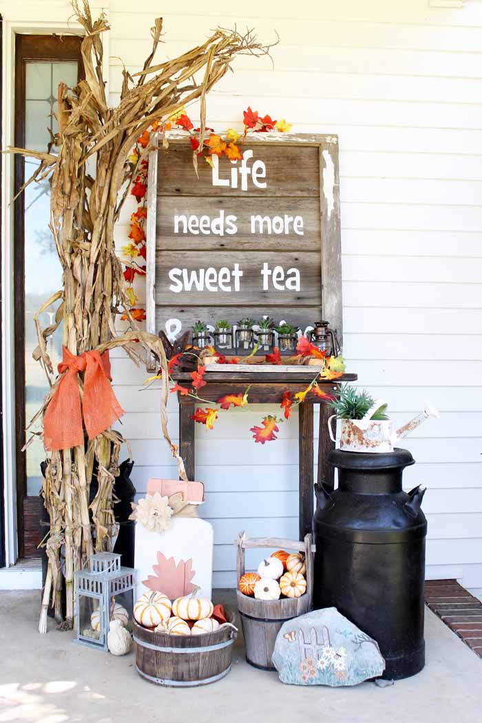 life needs more sweet tea pallet sign on a fall porch with corn tied