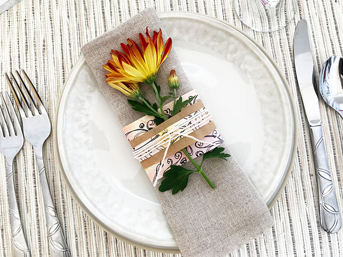 thanksgiving table decorated with paper napkin rings