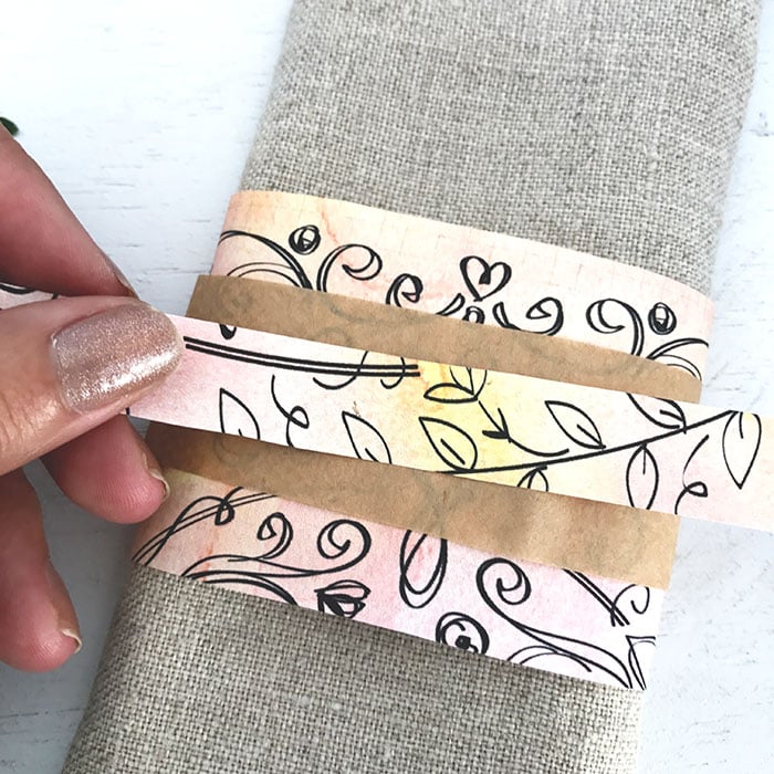 adding paper with doodles to a napkin ring