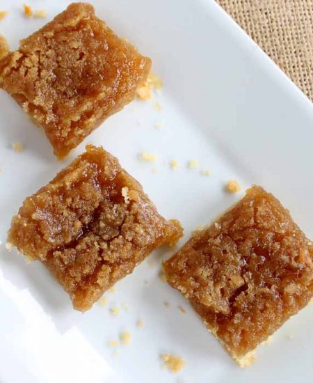 pear crisp recipe cut into squares on a plate