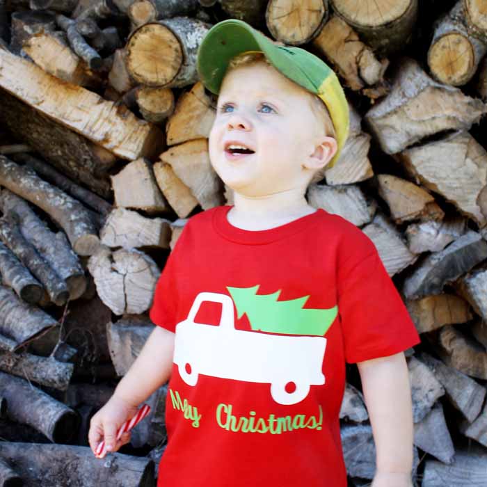 little boy wearing a christmas shirt made from t shirt vinyl