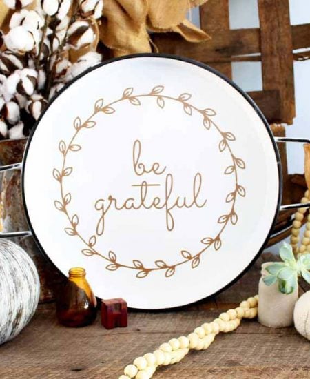 one white plate with be grateful text