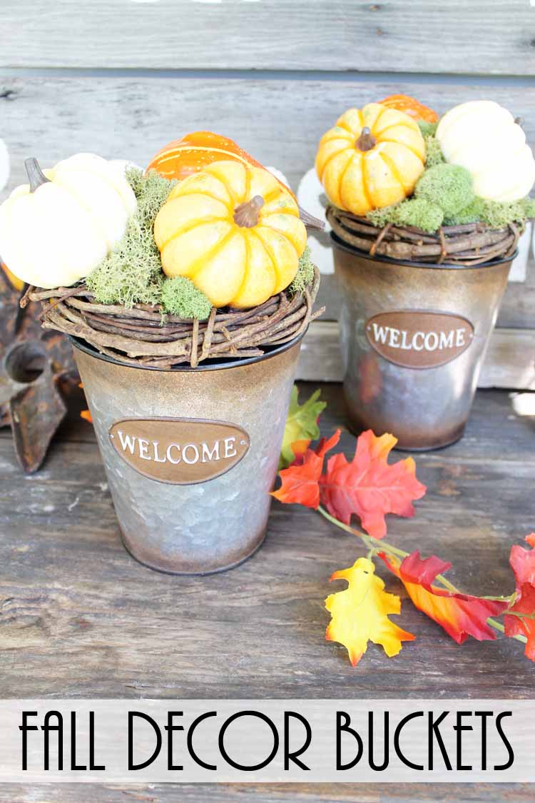 welcome fall arrangement on a wood table