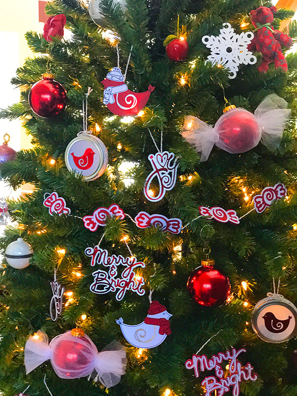 red and white ornaments on a christmas tree