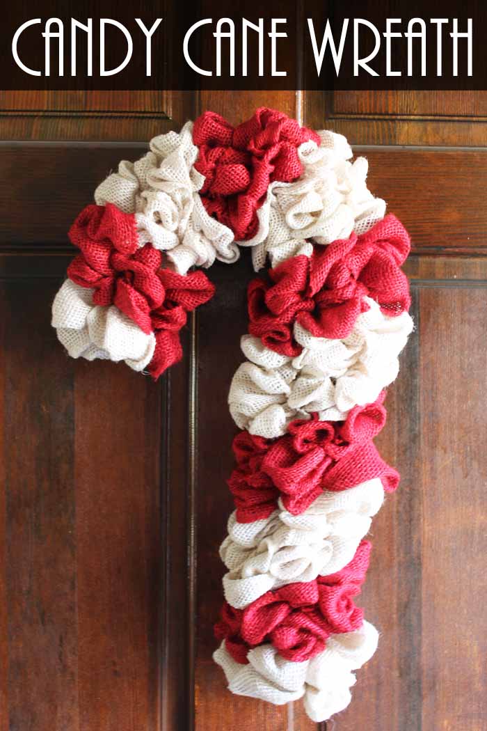 Learn how to make your own DIY candy cane wreath with these step by step instructions. Add this whimsical DIY Christmas wreath to your home! candy cane wreath