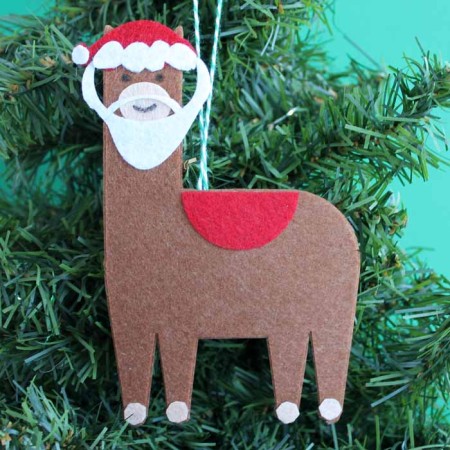 santa ornament with a llama for christmas