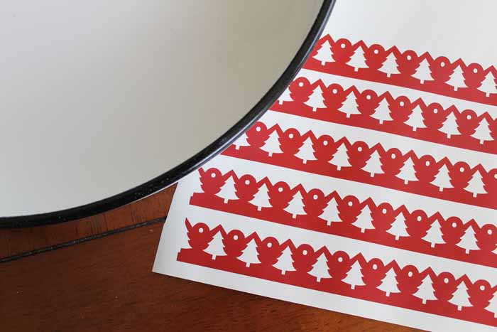 christmas tree shapes cut from red cricut vinyl