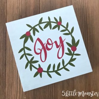 joy with wreath sign