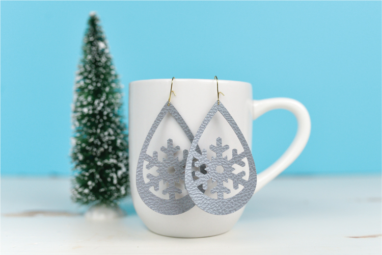 snowflake earrings cut on a cricut