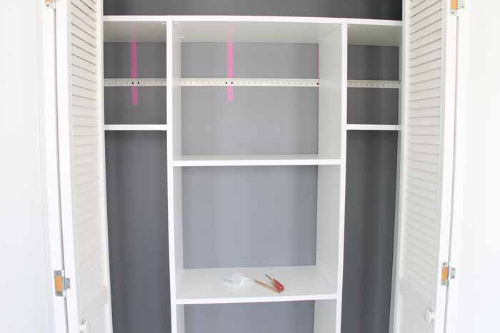 adding closet shelves to a wooden organizer