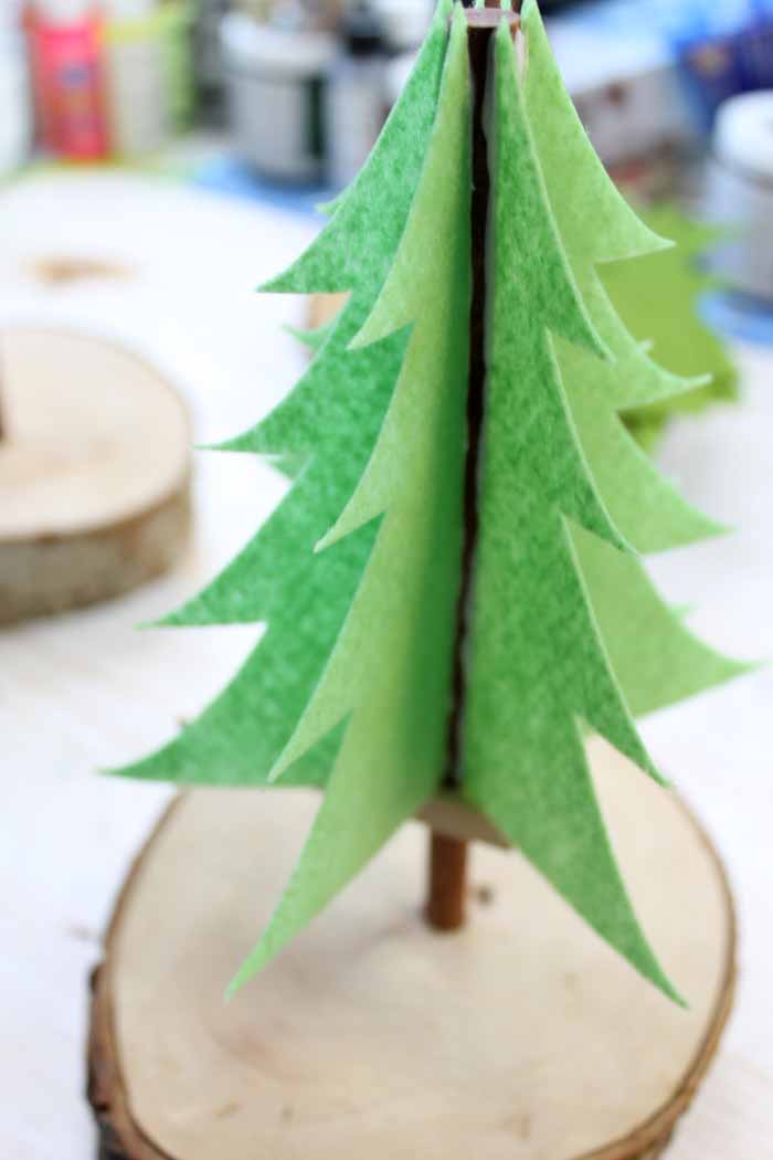 felt tree pieces on a wood dowel