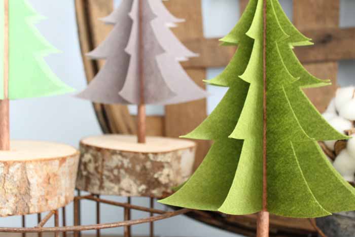 close up of christmas trees made from felt