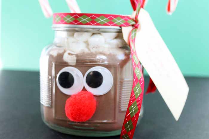 jar that looks like a reindeer filled with hot chocolate mix