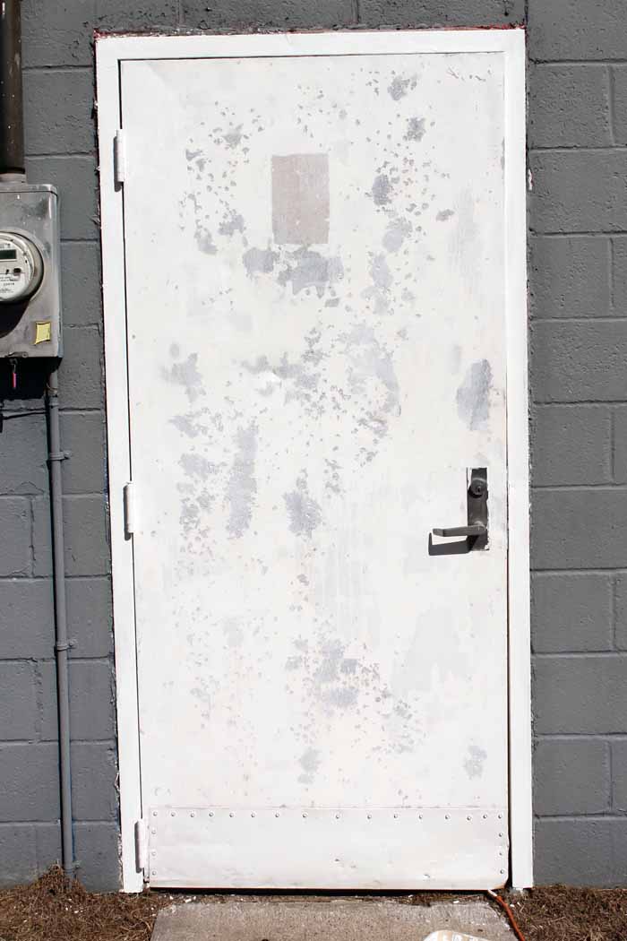 adding metal primer to a steel door