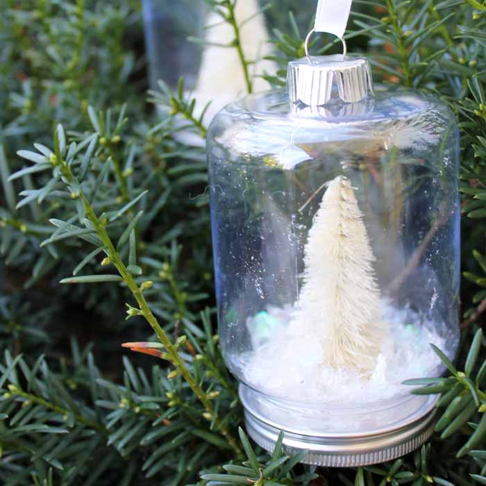 Make these plastic snow globes in a mason jar shape! You will love how easy these are to make yourself!