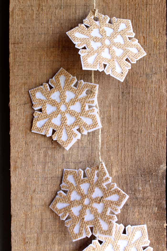 burlap snowflakes on wood