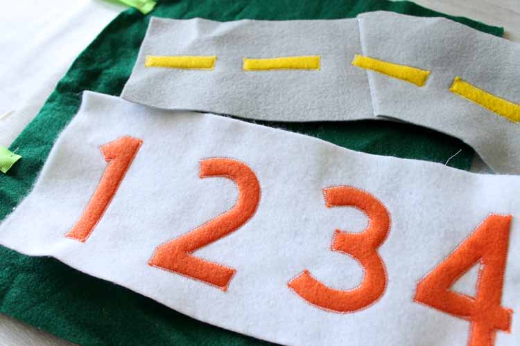 sewing around numbers on felt