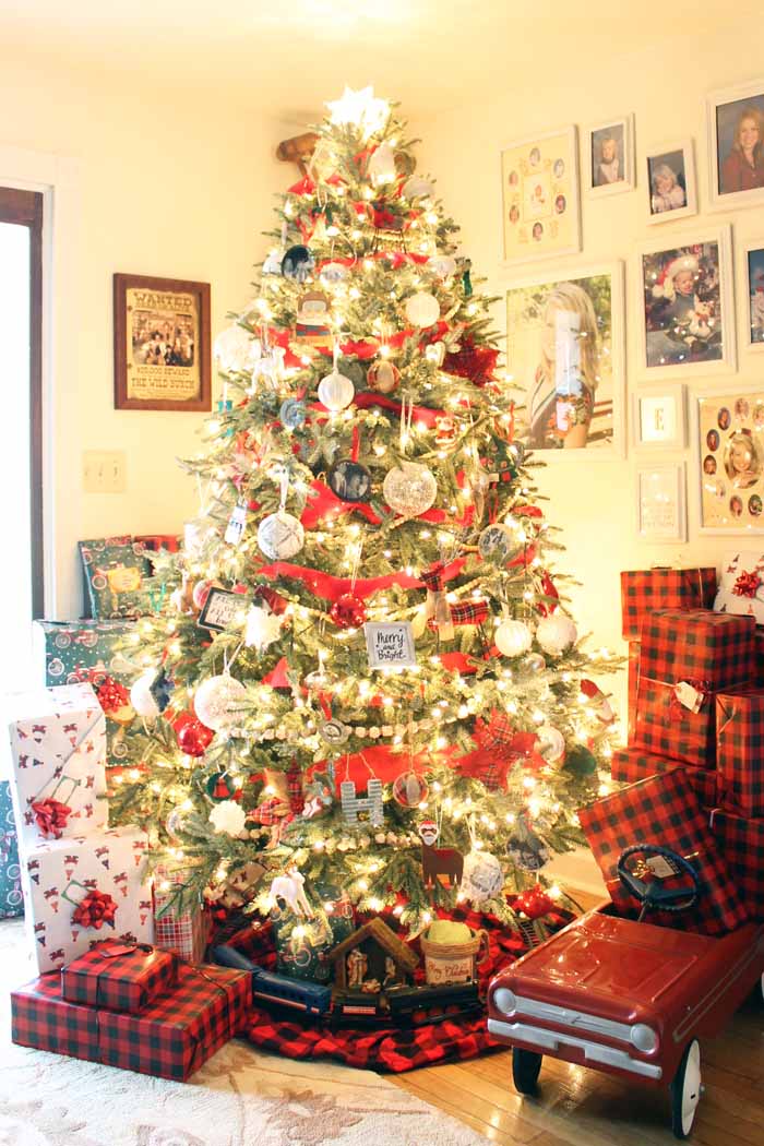 farmhouse style christmas tree with plaid presents underneath