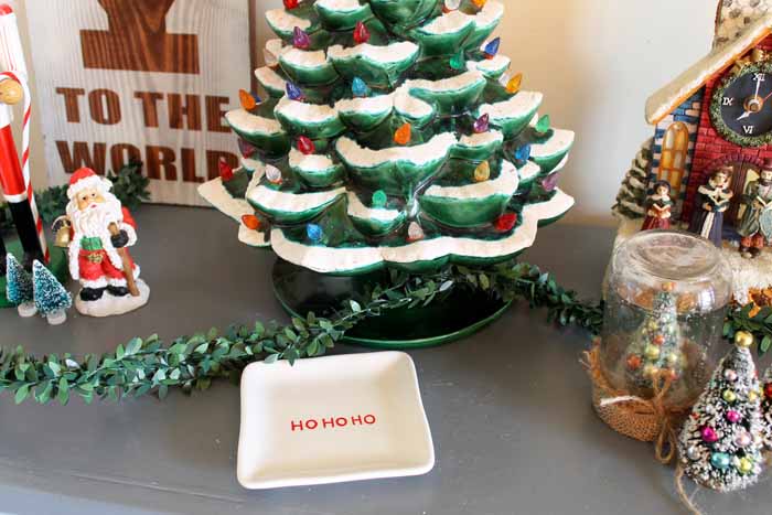 grey table decorated for christmas