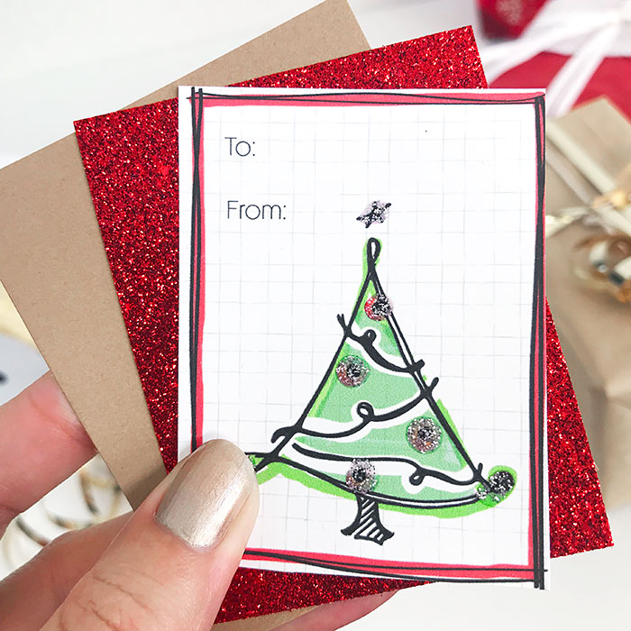 Cutsomize gift tags with glitter and paper layers