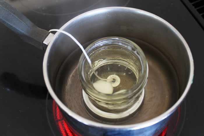 melted beeswax to make a candle