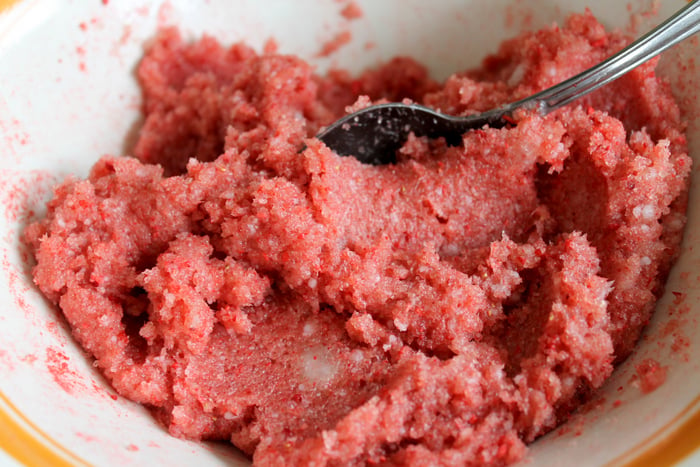 mixing sugar scrub in a bowl