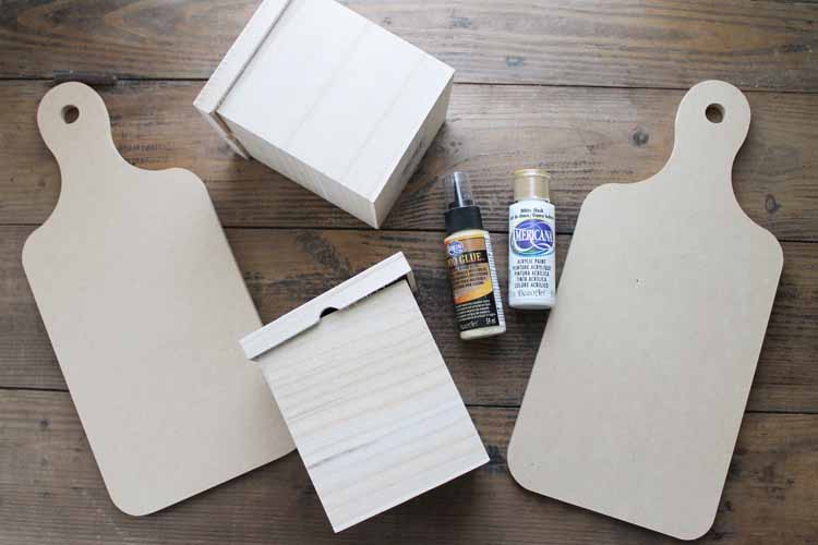 wooden pieces and paint on a table