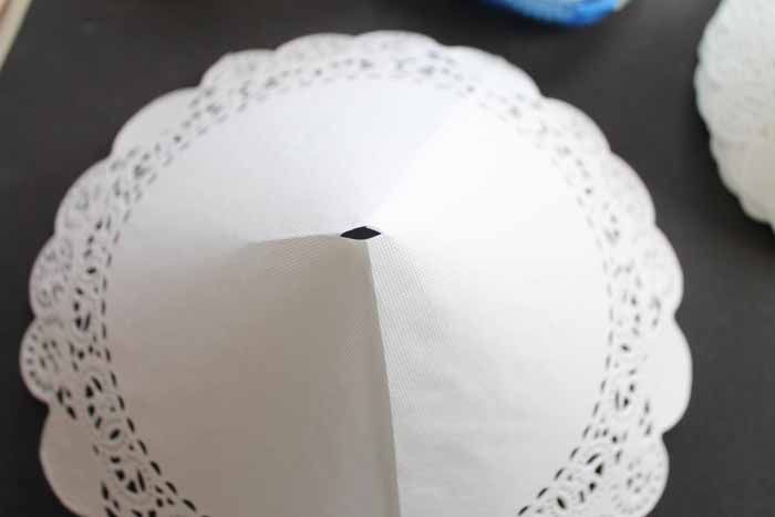 white doily with a hole cut in the center