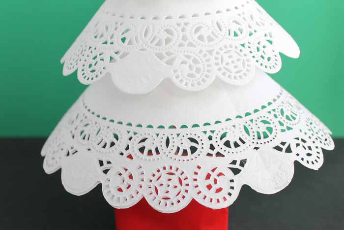 white doilies made into a christmas tree shape