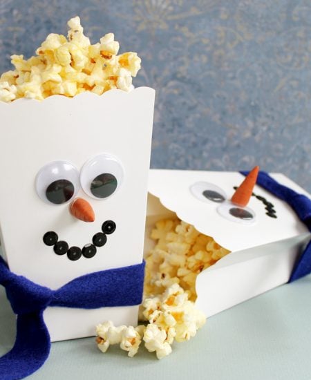 snowman popcorn box on a table