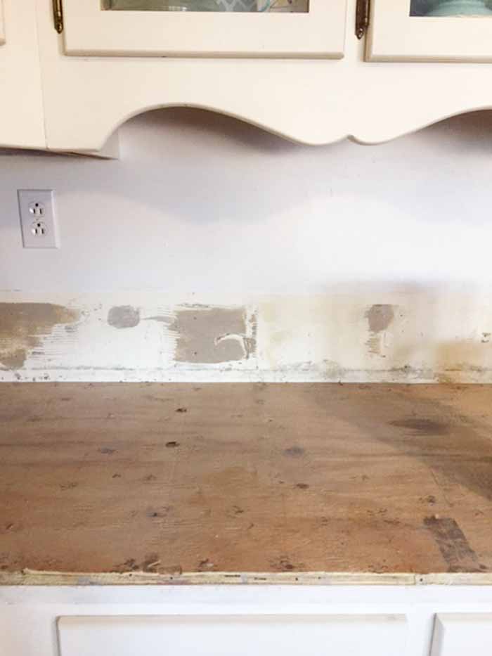 tile removed from counters in a kitchen